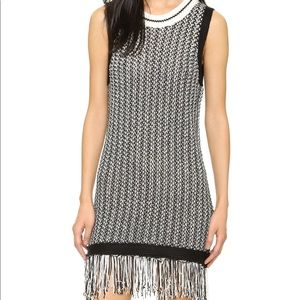 Black and white knit dress with fringe detail